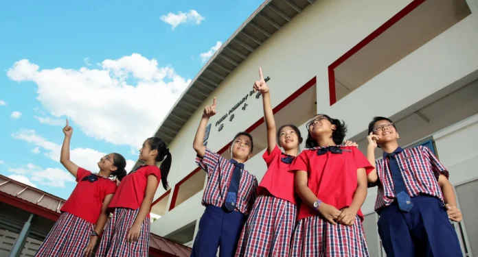 MOE Singapore school levels guide featuring children at a Singapore school