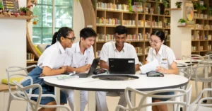 Secondary school students studying together in a Singapore learning space
